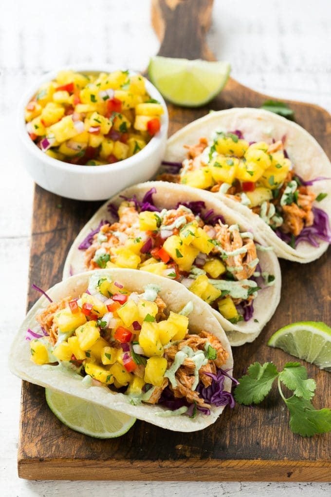 Pulled chicken tacos with a pineapple salsa topping.