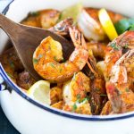 This recipe for New Orleans BBQ shrimp is tender and succulent shrimp cooked in a bold and zesty sauce - full of flavor and easy to make!