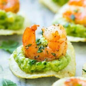 This recipe for Mexican shrimp bites is seared shrimp and guacamole layered onto individual potato chips. A super easy appetizer that's elegant enough for entertaining! #ad