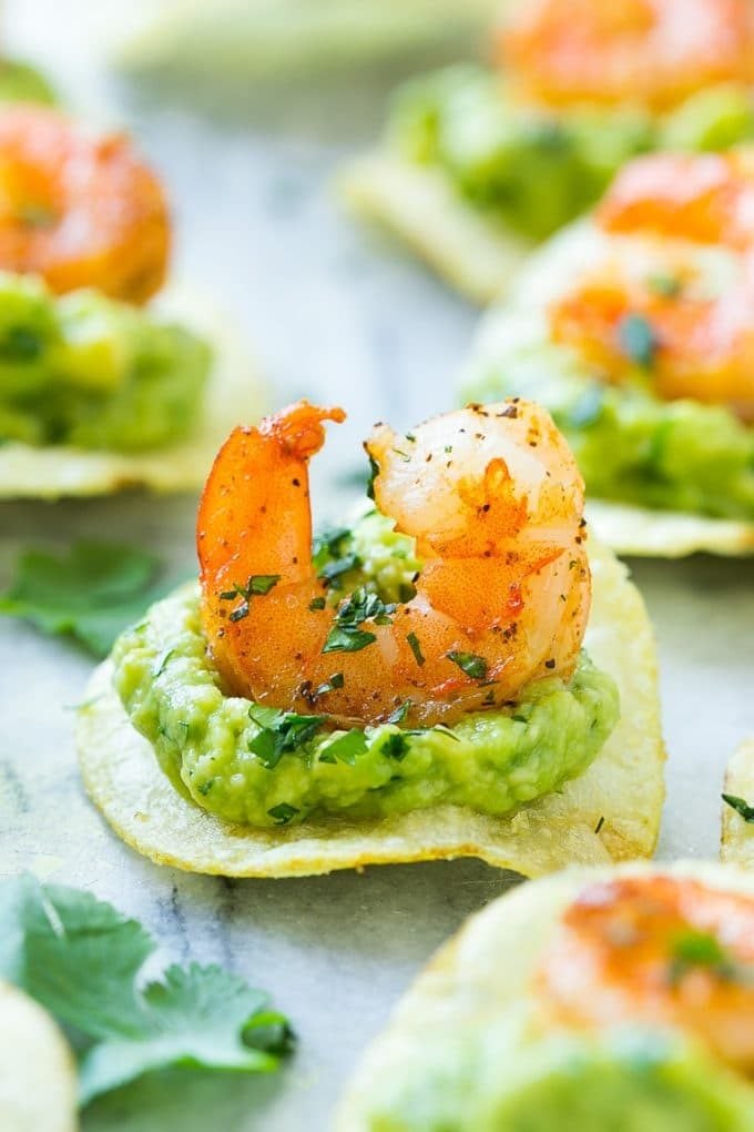 Mexican shrimp bites made with guacamole, spiced shrimp and potato chips.
