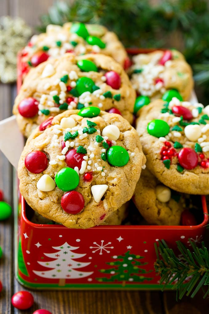 Christmas monster cookies in a gift tin.