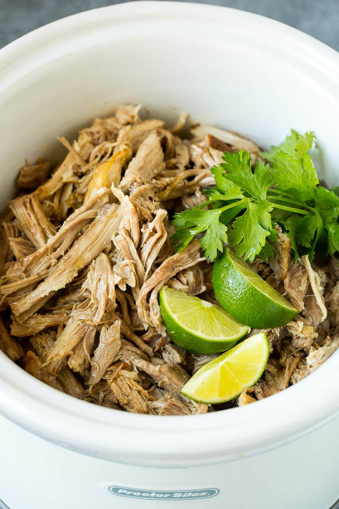 Shredded pork in a crock pot.