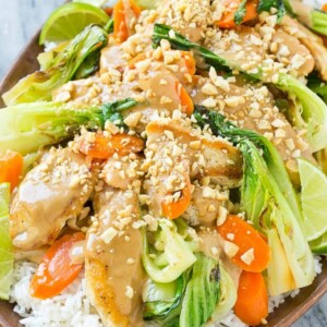 This recipe for Thai peanut chicken is a quick and easy stir fry with seared chicken and colorful vegetables, all covered in a homemade peanut sauce. Serve it with a side of rice for a complete meal that's ready in less than 30 minutes!