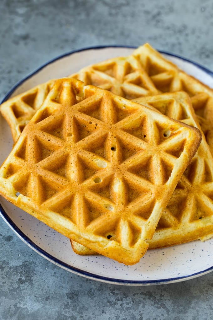 A plate of cooked waffles.