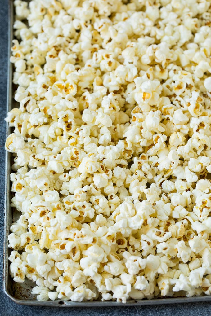 A sheet pan filled with popcorn