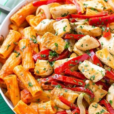 This recipe for chicken riggies is sauteed chicken with peppers and rigatoni pasta, all tossed in a creamy tomato sauce. This spicy chicken rigatoni dish is pure comfort food and can easily be doubled to serve a crowd! #ad