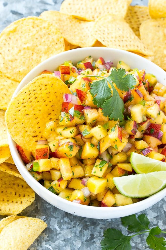 Peach salsa served with corn tortilla chips.