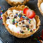 This recipe for breakfast sundaes is waffle cone cups layered with fresh fruit, Cheerios™ cereal and yogurt, then finished off with an array of fun toppings. A fun way to make breakfast special! #SummerOfCheerios #ad