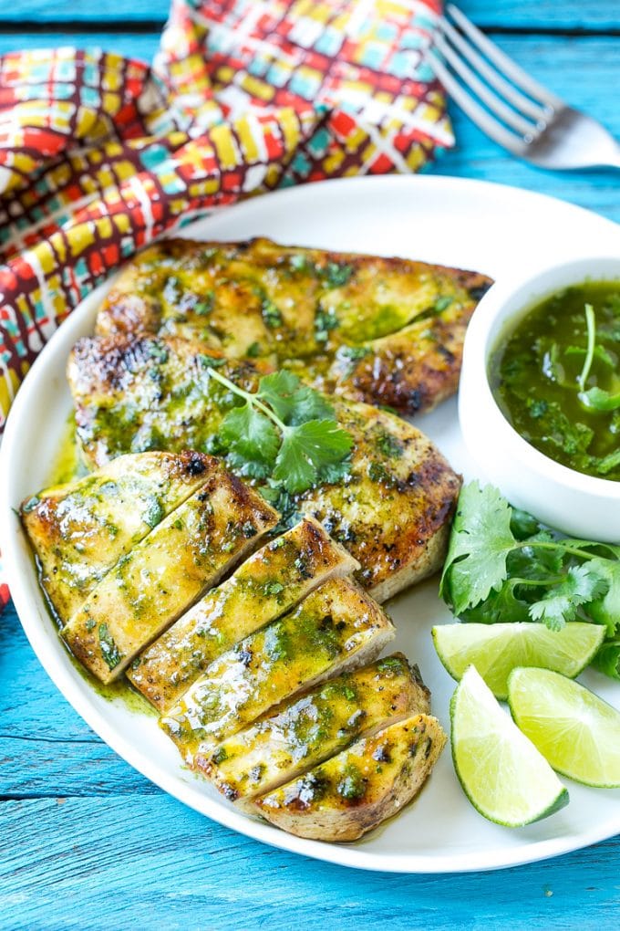 Sliced cilantro lime chicken on a serving plate.