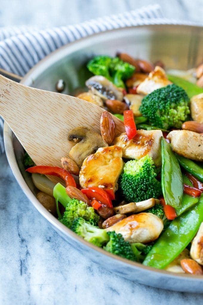 Chicken almond ding with chicken, broccoli, peppers, mushrooms and almonds, all in a savory sauce.