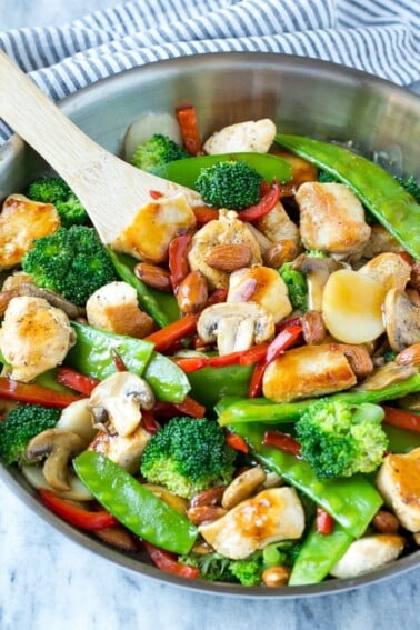 This recipe for chicken almond ding is a stir fry full of chicken, veggies and crunchy almonds, all tossed in a savory sauce. The perfect healthy dinner that's ready in a flash! #LaneToGreatness #ad