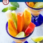 This recipe for Mexican fruit cups is spears of tropical fruit, stacked in a glass and sprinkled with chili lime seasoning.