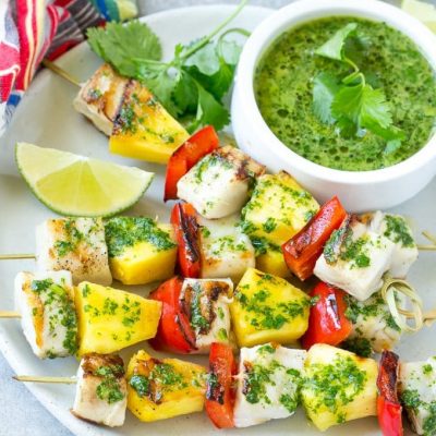 This recipe for mojo fish kabobs is skewers of mild fish, pineapple and peppers, all flavored with a bright and zesty sauce and grilled to perfection. An unexpected yet delicious appetizer! TheBetterFish AD