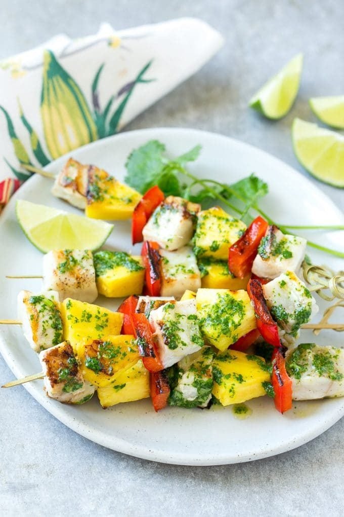 Fish kabobs with green mojo sauce.