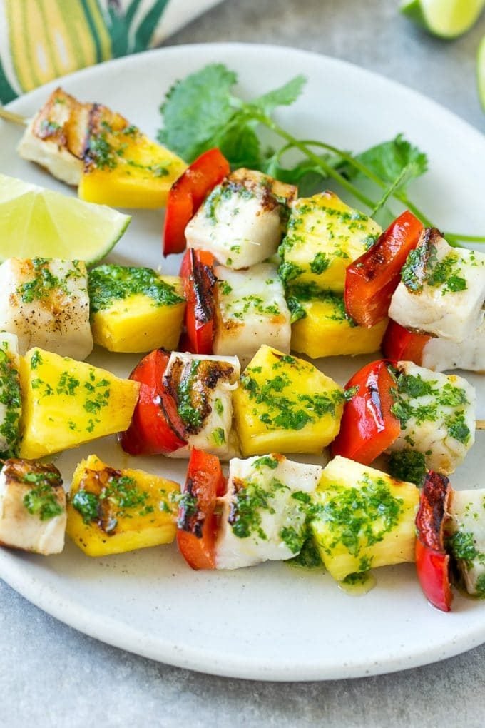 Grilled fish, peppers and pineapple on skewers.