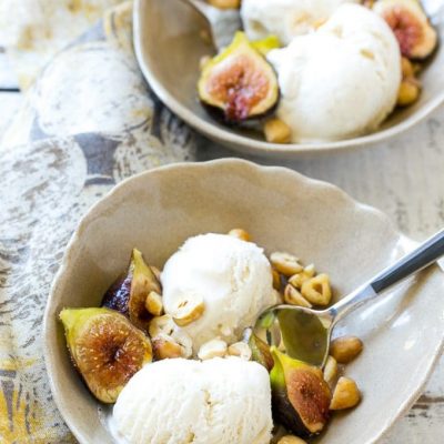 This recipe for spice roasted figs with hazelnuts and vanilla ice cream is a cool and refreshing treat that showcases fresh figs. It's an easy dessert that the whole family will love! #Breyers150 #ad