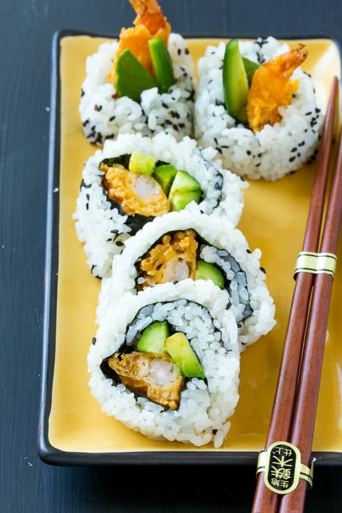 A serving of shrimp tempura roll sushi made with cucumber, avocado and shrimp.