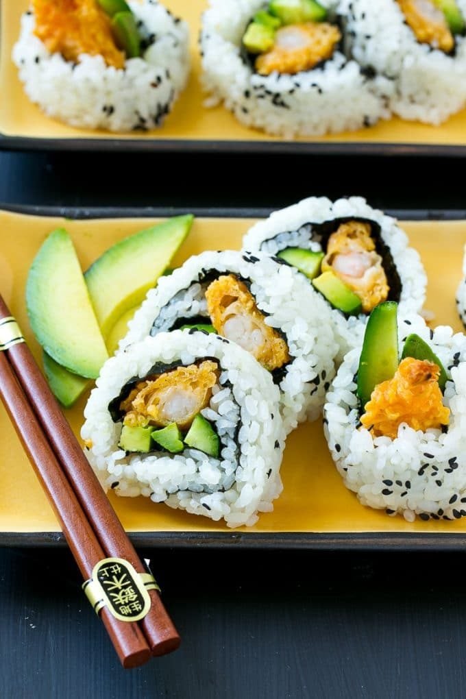 Shrimp tempura sushi roll with cucumber, avocado and crispy shrimp.