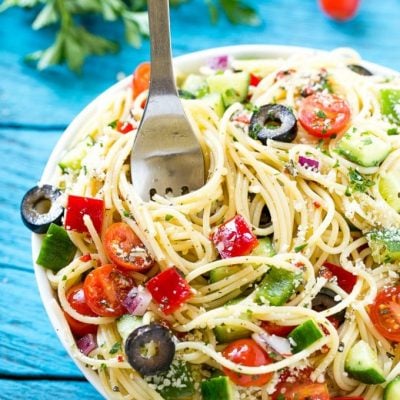 This recipe for spaghetti salad is a unique pasta salad full of crunchy vegetables and parmesan cheese, all tossed together in a homemade zesty Italian dressing. The perfect dish to feed a crowd when you're entertaining! #ecover #ad