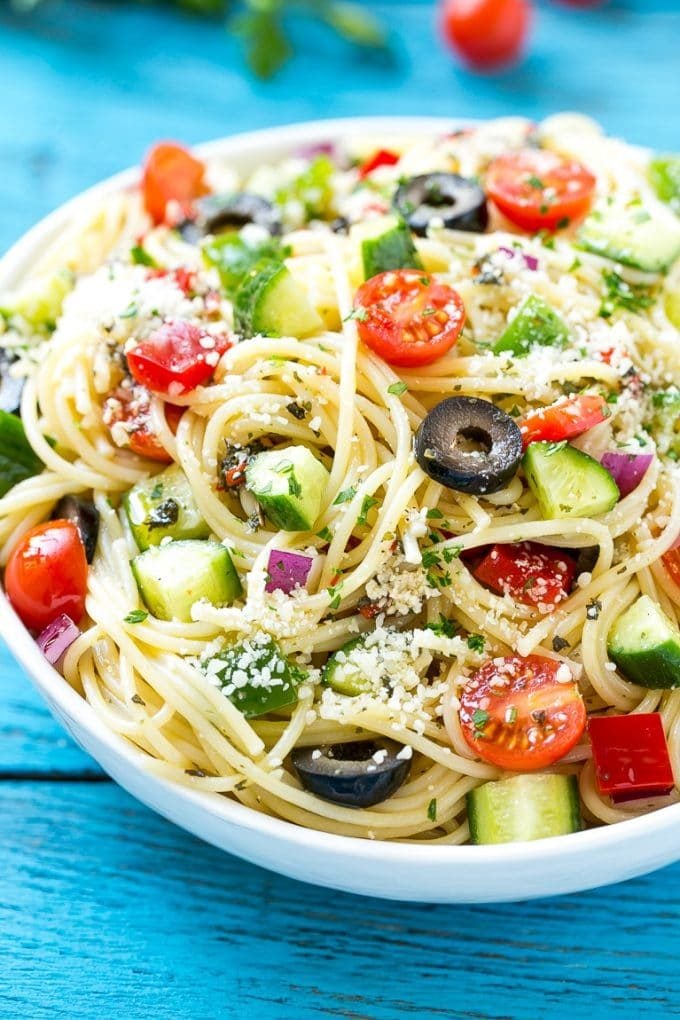 This recipe for spaghetti salad is a unique pasta salad full of crunchy vegetables and parmesan cheese, all tossed together in a homemade zesty Italian dressing. The perfect dish to feed a crowd when you're entertaining! #ecover #ad