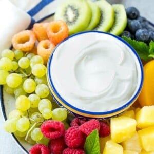 This recipe for cream cheese fruit dip is a light and creamy 3 ingredient dip that's perfect with your favorite fruit. A wholesome snack that's perfect for parties or for eating while watching TV!