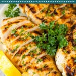 This recipe for Greek lemon chicken is chicken breast marinated with olive oil, lemon juice and herbs, then grilled to perfection.