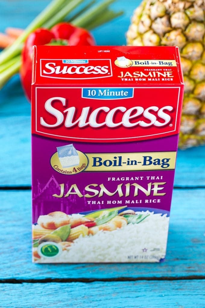 This recipe for pineapple fried rice is loaded with chicken, bacon, crunchy veggies and juicy pineapple. A simple and easy main course or side dish that's MUCH better than take out! #Back2SchoolSuccess #ad