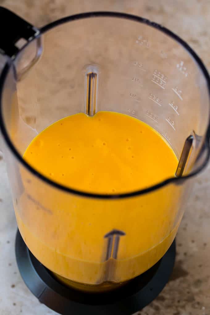 A smoothie inside of a blender.