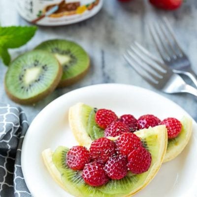 Have fun with your breakfast and turn regular old toaster waffles into watermelon designs with Nutella and fresh fruit! ad