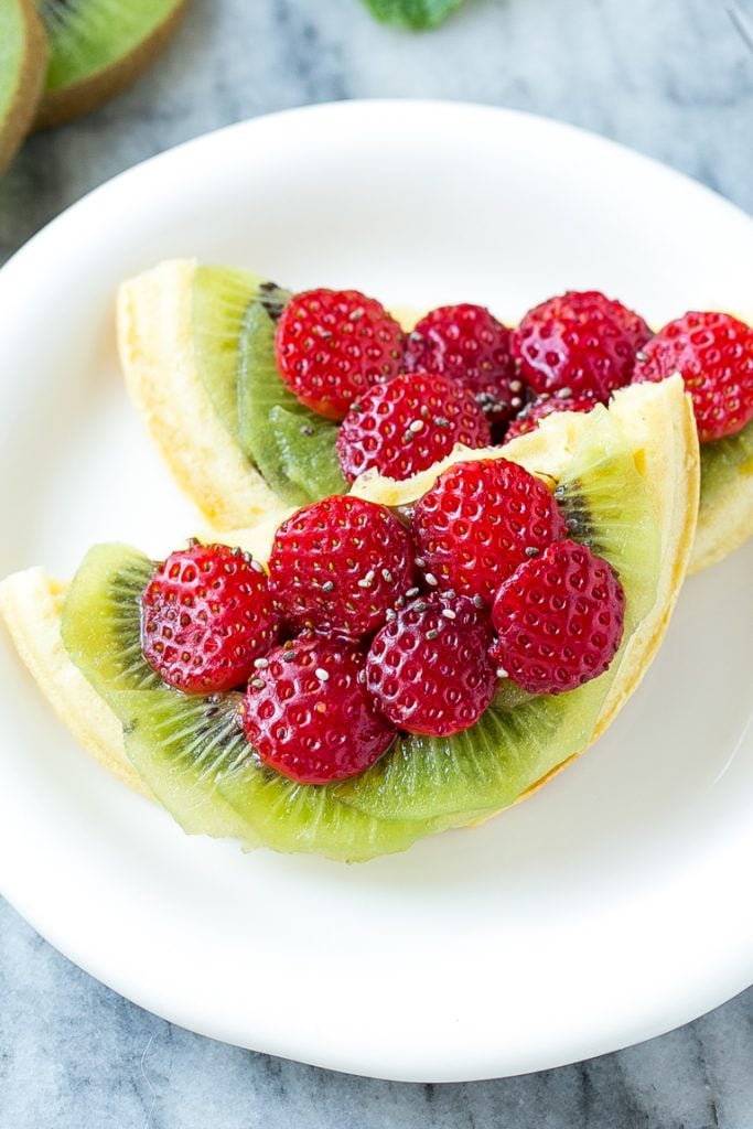 Have fun with your breakfast and turn regular old toaster waffles into watermelon designs with Nutella and fresh fruit! AD