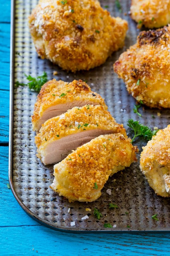 This recipe for baked fried chicken is ultra crispy chicken that's been baked in the oven for a lighter take on the classic. This oven fried chicken will quickly become a family favorite! NewComfortFood AD
