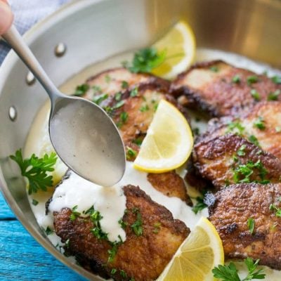 This recipe for pork scallopini is tender marinated pork, seared to a golden brown and topped with a creamy lemon sauce. A quick and easy dinner that's ready in 30 minutes! #ad