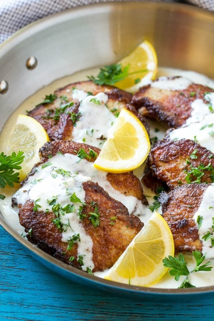 Pork loin sliced breaded and coated in a creamy sauce.