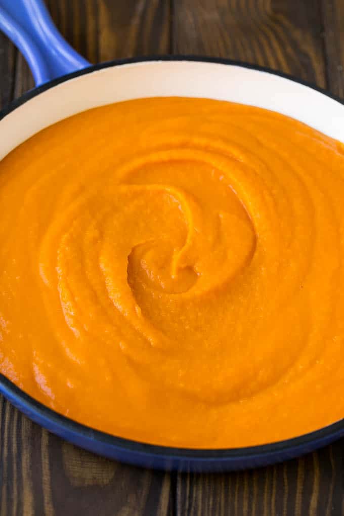 Creamy butternut squash sauce in a pan.