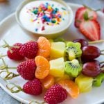 This recipe for fruit kabobs is a rainbow of fruit served on skewers with a yogurt dipping sauce. This recipe for fruit kabobs is a rainbow of fruit served on skewers with a yogurt dipping sauce..