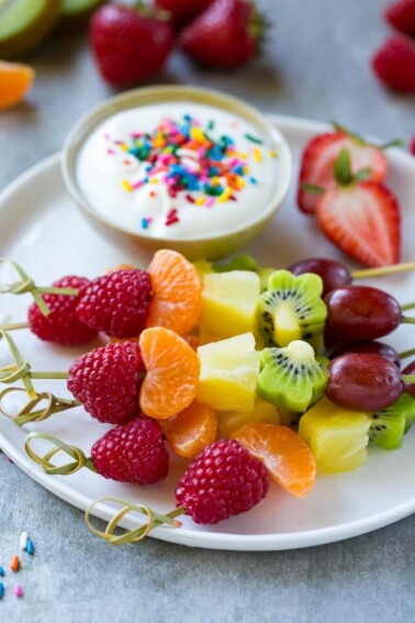 This recipe for fruit kabobs is a rainbow of fruit served on skewers with a yogurt dipping sauce. This recipe for fruit kabobs is a rainbow of fruit served on skewers with a yogurt dipping sauce..