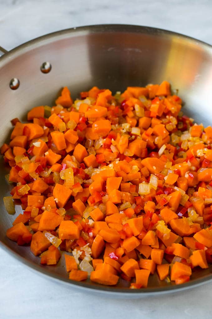 Cooked vegetables in a skillet.