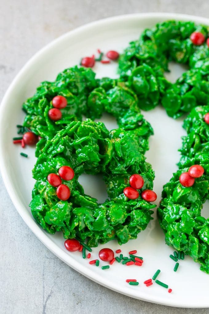 A platter of cornflake cookies shaped like wreaths.