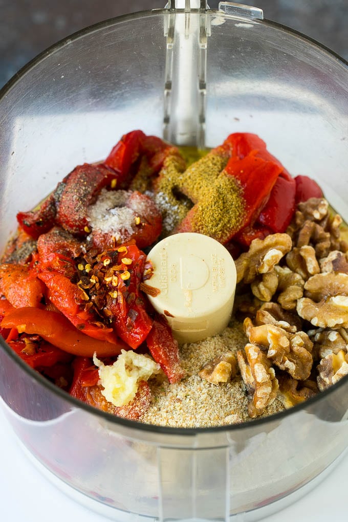 Roasted red peppers, walnuts, spices, olive oil and breadcrumbs in a food processor.