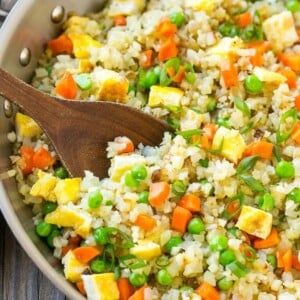This cauliflower fried rice has all the flavors of your favorite take out dish, but without the carbs; the perfect healthier side dish!