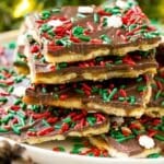 A platter of Christmas crack, garnished with holiday sprinkles.