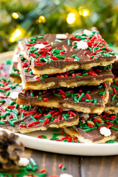 A platter of Christmas crack, garnished with holiday sprinkles.