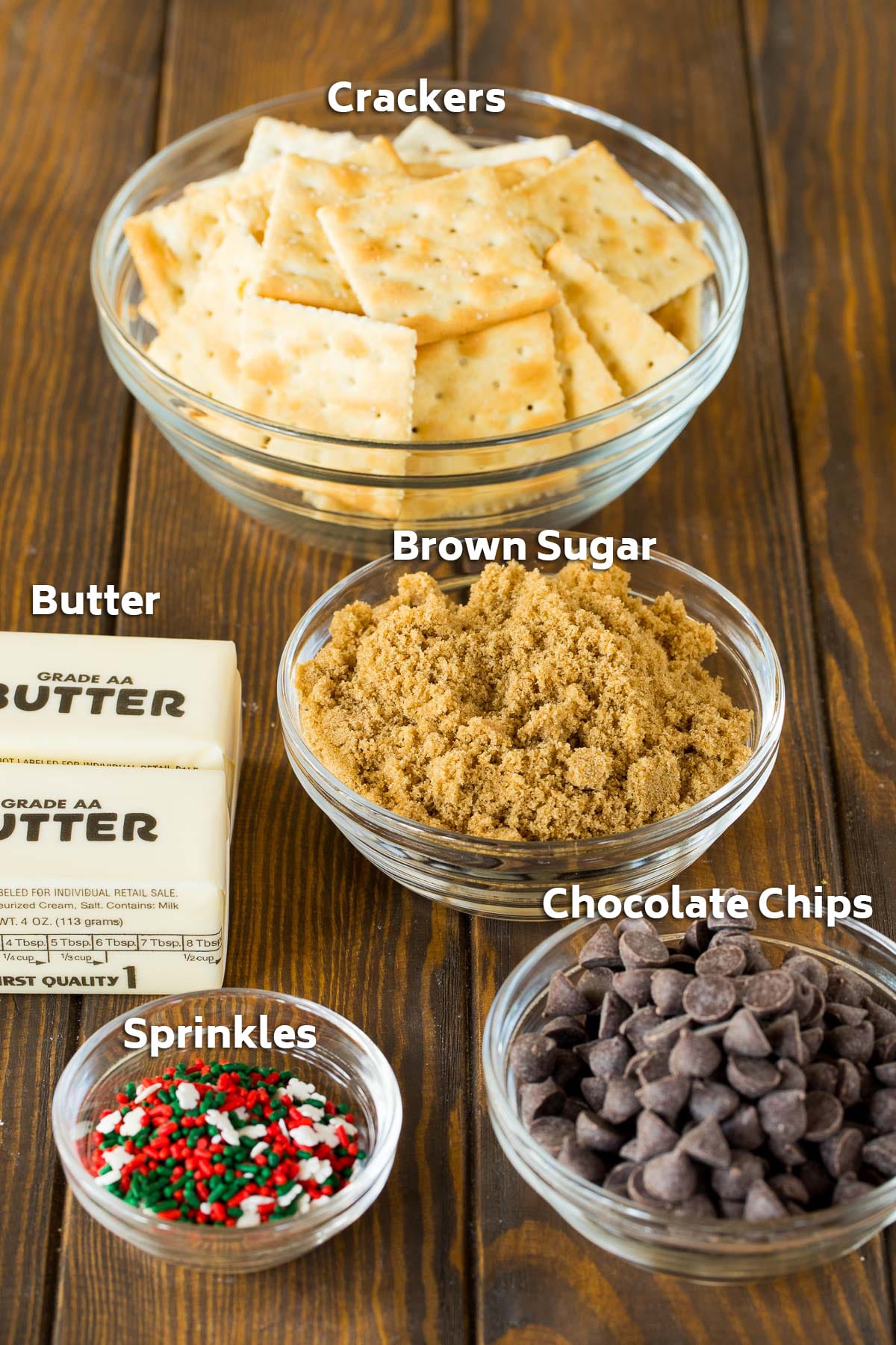 Ingredients including crackers, chocolate, brown sugar, butter and sprinkles.