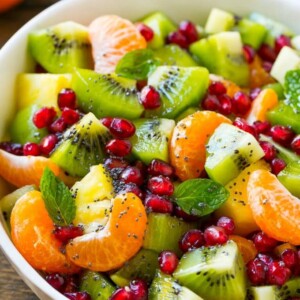 This winter fruit salad is a colorful variety of fresh fruit tossed in a light honey poppy seed dressing.
