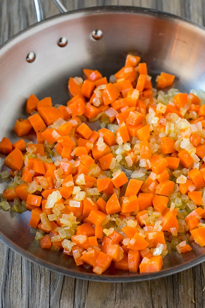 Carrots, onion and garlic in a skillet.