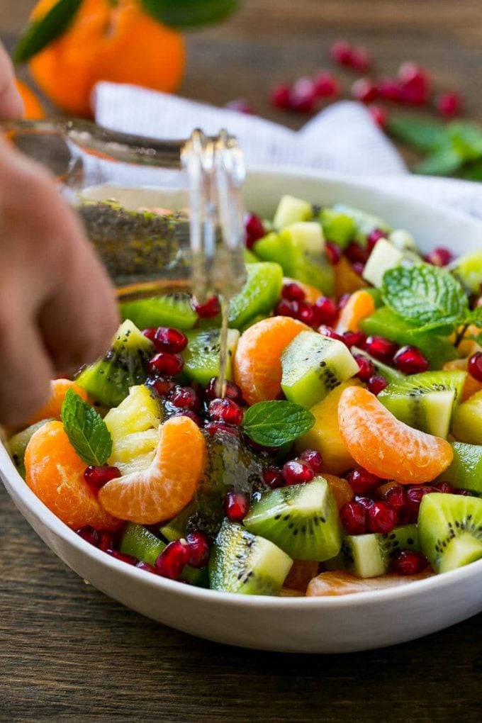 Winter fruit is topped with an easy sweet and tangy poppy seed dressing.
