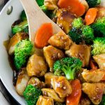 This honey garlic chicken stir fry recipe is full of chicken and veggies, all coated in the easiest sweet and savory sauce. A healthier dinner option that the whole family will love!