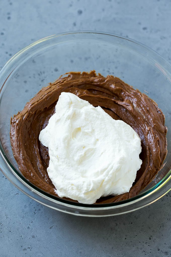 Whipped cream to be folded into chocolate fruit dip.