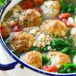 This hearty farro soup recipe is filled with turkey meatballs, white beans and kale. It's the perfect easy and nutritious dinner option!
