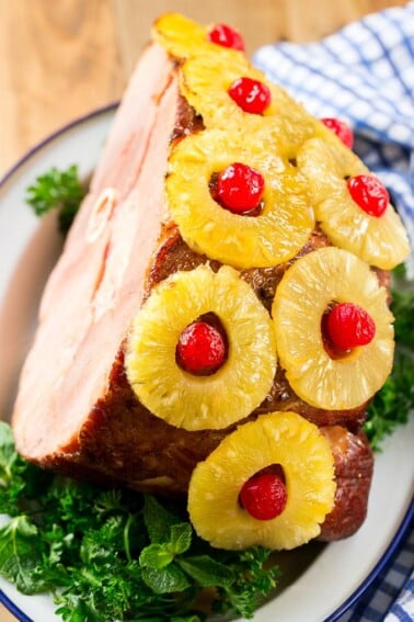 This ham with pineapple and cherries is a classic recipe with one secret ingredient that really takes it over the top. The ULTIMATE holiday ham!